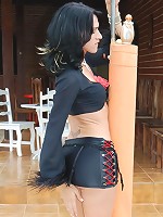 Tranny with long legs strips naked
