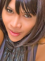 Elegantly dressed ladyboy in her smart silky scarf
